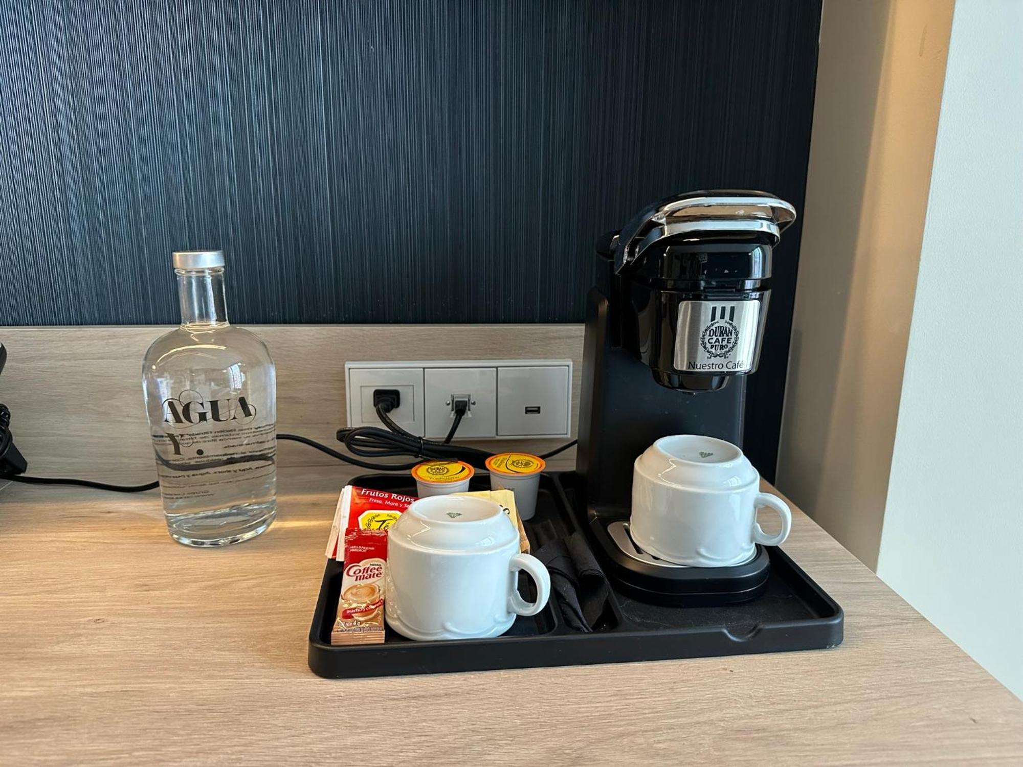 Gran Evenia Panama Hotel Exterior foto A single serve coffee machine